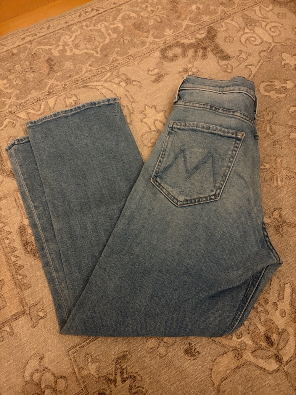 Mother Classic Light Wash Jeans with Back Pocket Stitching